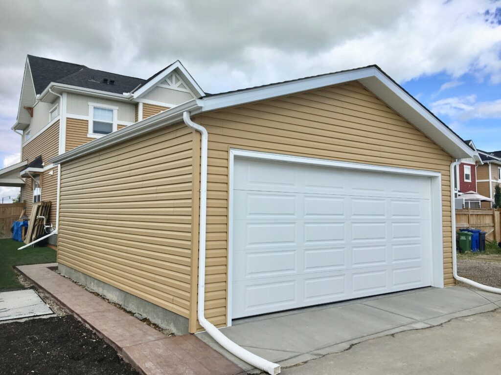 Alley Garage For A New Build with Siding